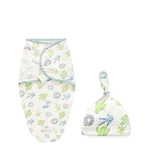 Stevvex newborn swaddle wrap and hat set in white featuring green cactus and blue accents on Tampa Home & Garden Store