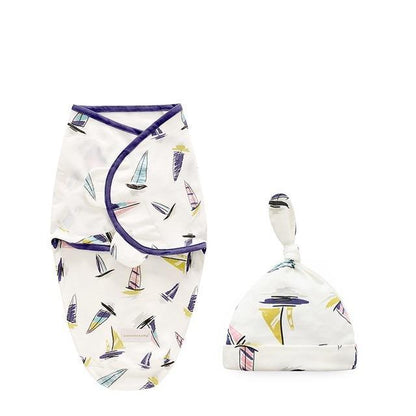 Newborn swaddle wrap set by Stevvex with sailboat print, white, purple trim, hat on Tampa Home & Garden Store