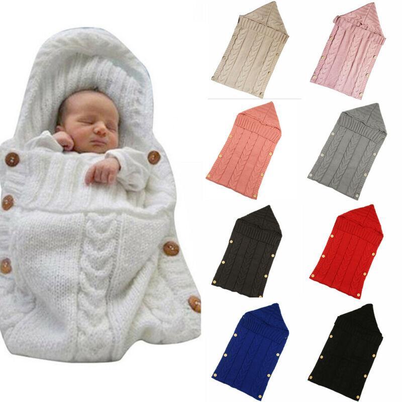 Stevvex warm knitted newborn swaddle blanket in white with cable knit and buttons on Tampa Home & Garden Store