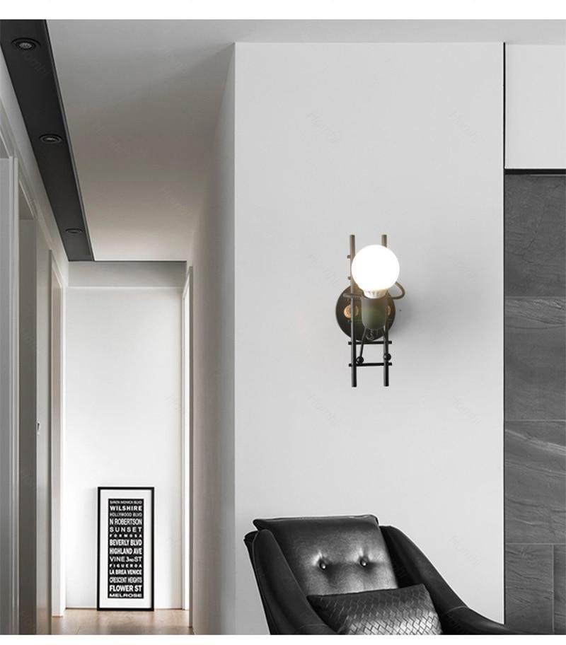 Modern retro doll sconce lamp by Stevvex on black metal ladder with white globe wall light on Tampa Home & Garden Store