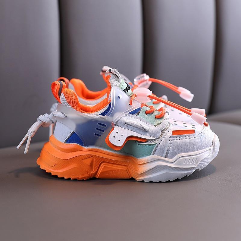 Stevvex baby sneakers with orange sole and colorful upper, breathable and non-slip bottom on Tampa Home & Garden Store