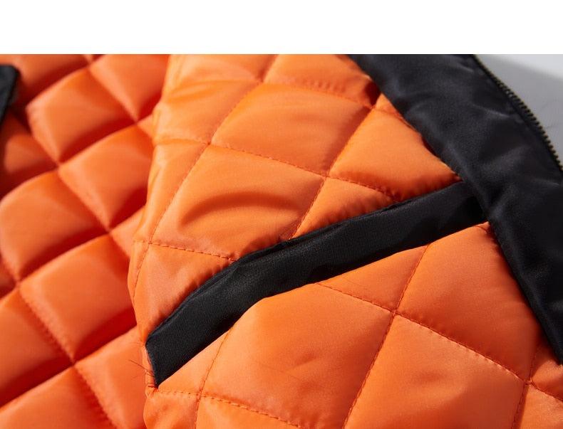 Men's orange quilted Stevvex puffer jacket with black trim pocket on Tampa Home & Garden Store