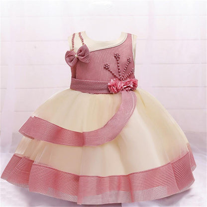 Stevvex baby girl princess dress with pink bodice and cream layered tulle skirt, bow and sash on Tampa Home & Garden Store