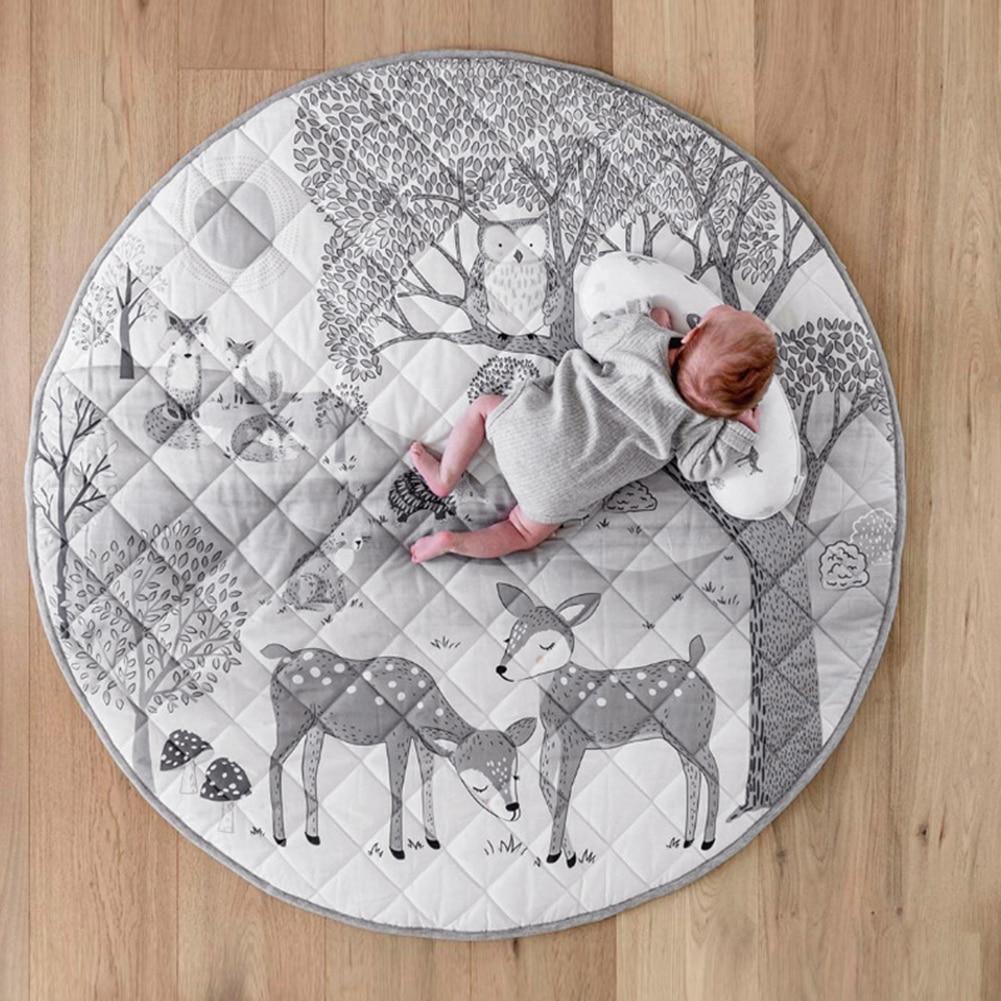Stevvex round Nordic forest animals baby play mat in gray quilted grid with deer and trees on Tampa Home & Garden Store