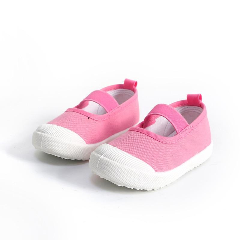 Baby girl canvas sneakers pink with white toe caps and a top strap for toddlers on Tampa Home & Garden Store
