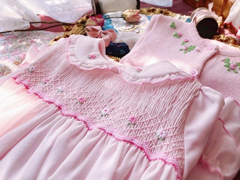 Stevvex pink baby girl dress with smocked bodice and floral embroidery long sleeves on Tampa Home & Garden Store