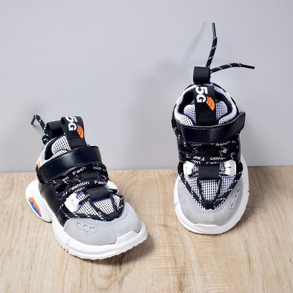 Stevvex toddler sneakers pair, black white mesh upper, lace-up with Velcro strap on Tampa Home & Garden Store