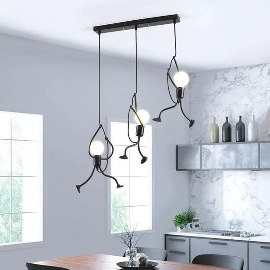 Industrial metal pendant light trio by Stevvex with globe bulbs, black finish, modern chandelier on Tampa Home & Garden Store
