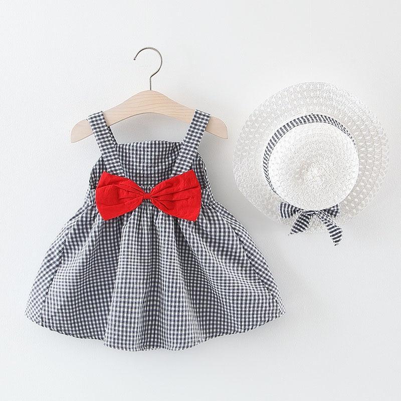 Modern Luxury Baby Girl Dress set in gray gingham with red bow and white woven hat on Tampa Home & Garden Store