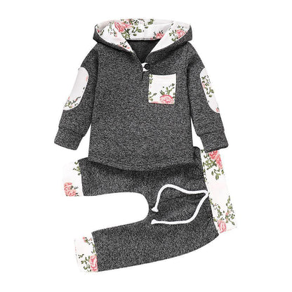 Newborn Stevvex hoodie and pant 2pc outfit in dark heather knit with floral patches on sleeves and hood lining on Tampa Home & Garden Store