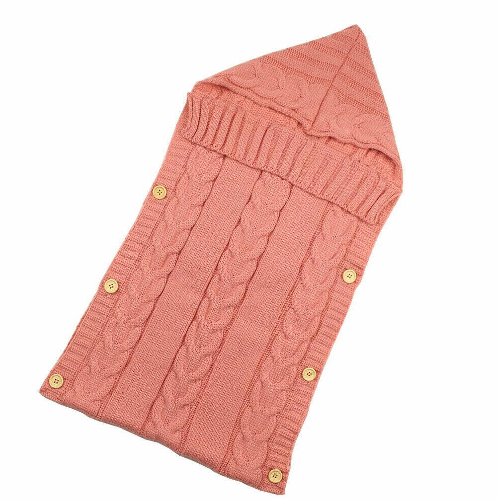 Stevvex warm pink cable-knit baby swaddle blanket with wooden buttons and soft cotton envelope on Tampa Home & Garden Store