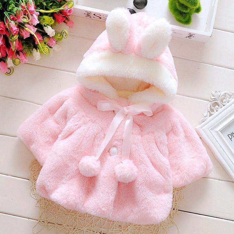 Baby pink faux-fur coat by Stevvex with hood, bunny ears, white trim, ribbon tie on Tampa Home & Garden Store
