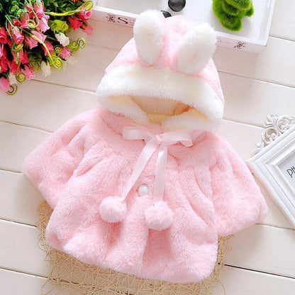 Baby pink faux-fur coat by Stevvex with hood, bunny ears, white trim, ribbon tie on Tampa Home & Garden Store