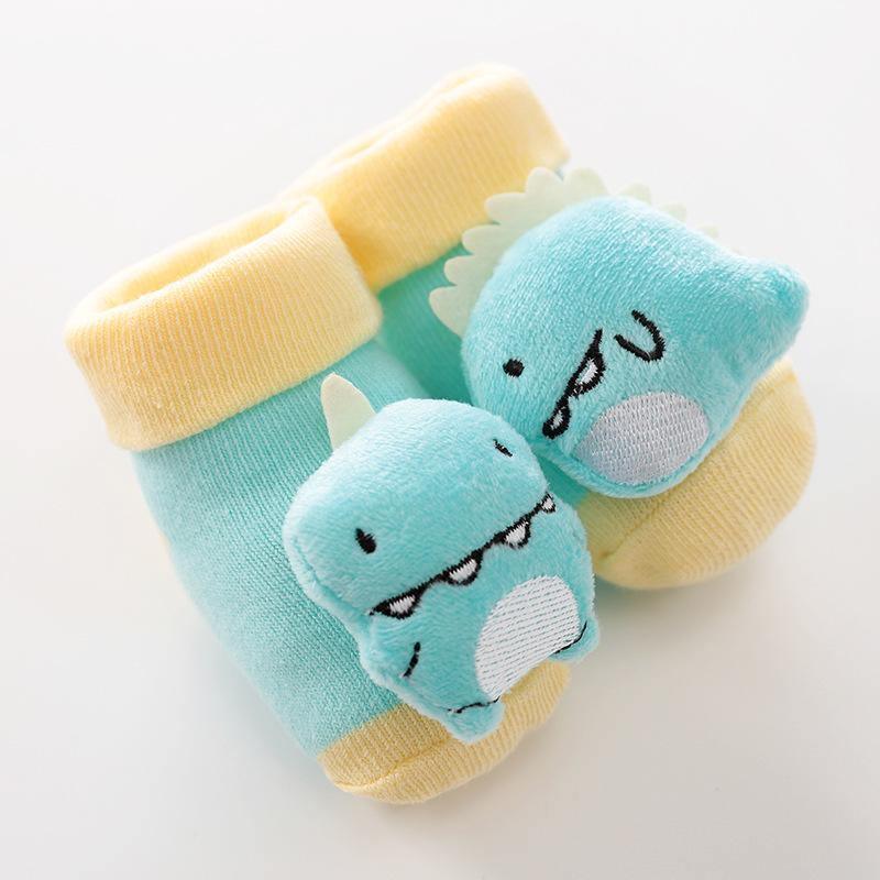 Stevvex cartoon dinosaur baby socks with plush dino faces; cotton non-slip teal blue with yellow cuffs on Tampa Home & Garden Store