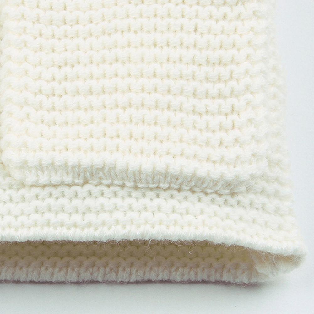 Stevvex newborn knitted hooded jacket fabric close-up in cream, chunky ribbed knit on Tampa Home & Garden Store