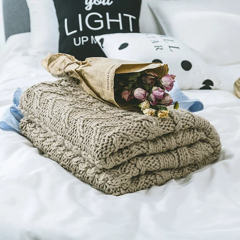 DecorBites Khaki Beige Chunky Knit Wool Blanket, thick textured knit on bed with bouquet on Tampa Home & Garden Store