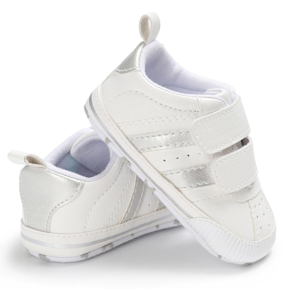 Fashion Soft Sole Hook Loop Pre Walker Sneakers pair white leather unisex baby shoes on Tampa Home & Garden Store