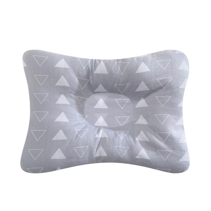 Stevvex nursing pillow gray with white triangle print, curved design with central opening on Tampa Home & Garden Store