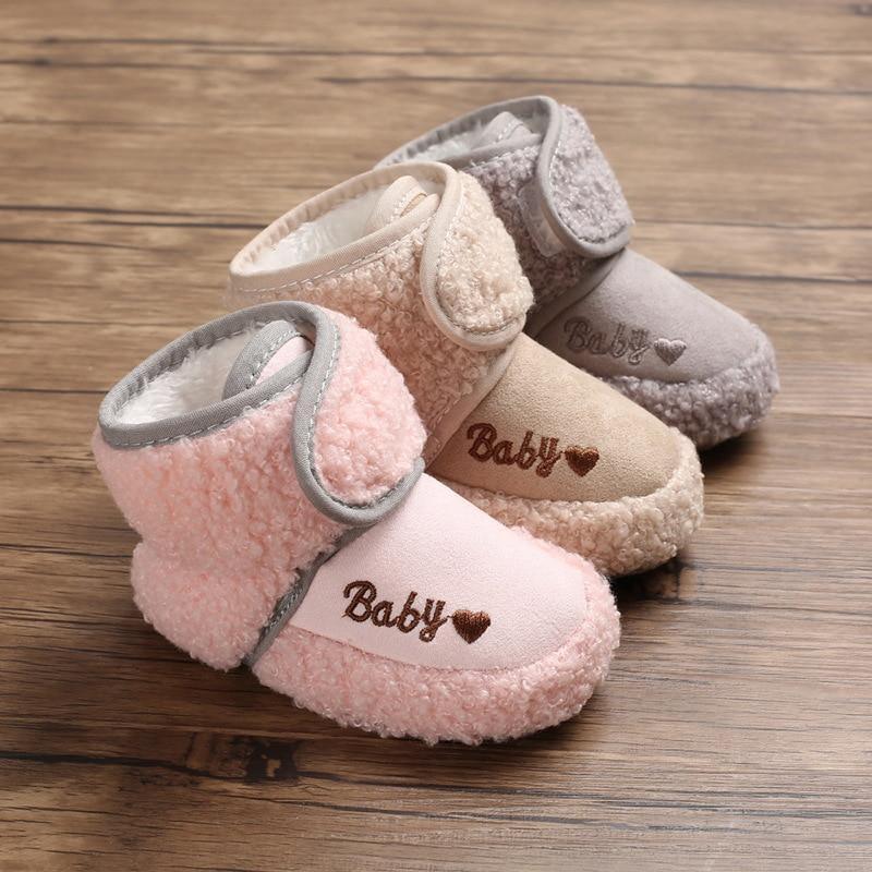 Newborn plush booties set of 4 in pastel with fluffy lining and Baby embroidery on toes on Tampa Home & Garden Store