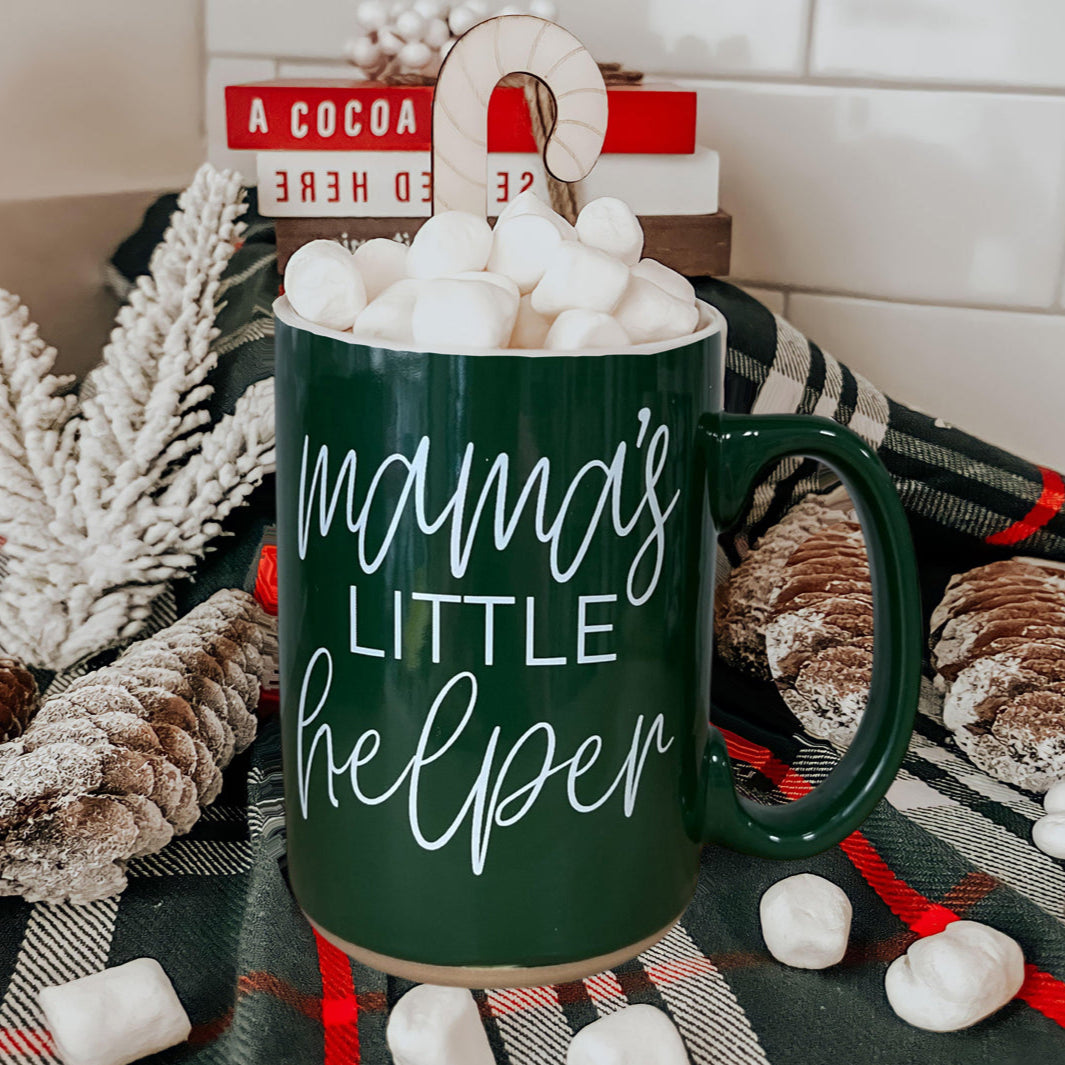 Mama's Little Helper mug by Gia Roma, green ceramic, marshmallows and candy cane on display on Tampa Home & Garden Store