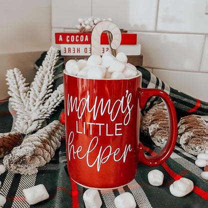 Red Mama's Little Helper mug filled with marshmallows and a candy cane, holiday plaid backdrop on Tampa Home & Garden Store