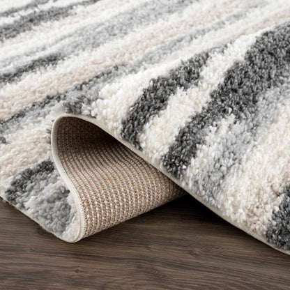 Zoya irregular striped area rug by Boutique Rugs; plush cream gray beige shag on Tampa Home & Garden Store