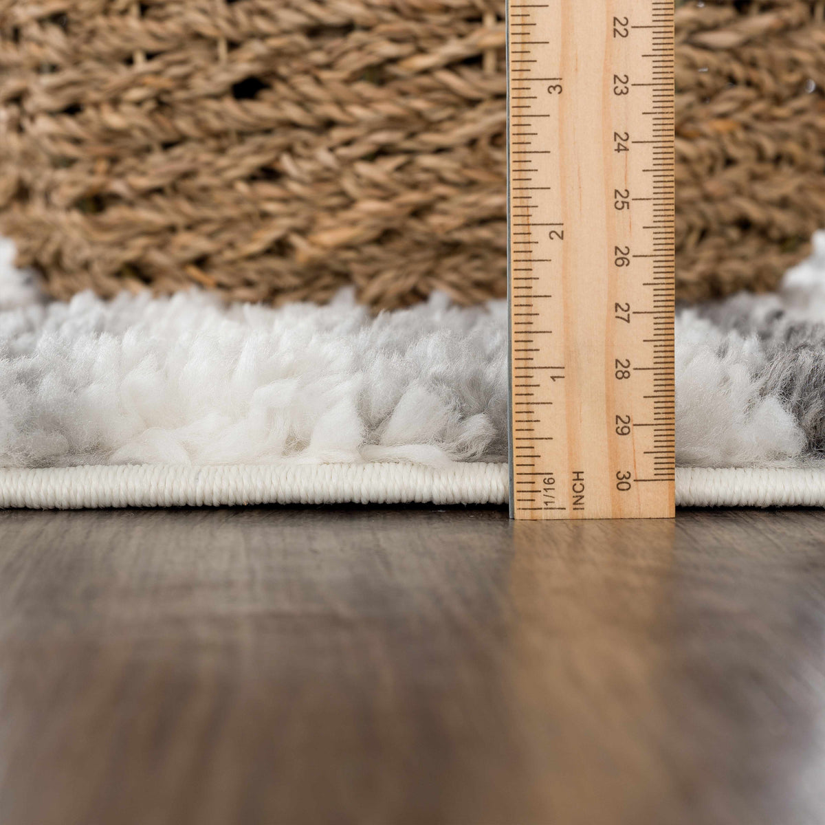 Rug Zoya irregular striped area rug warm brown tones Boutique Rugs ruler for scale on Tampa Home & Garden Store