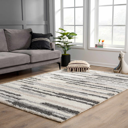 Zoya Irregular Striped Area Rug in gray and white with plush textured pile by Boutique Rugs on Tampa Home & Garden Store
