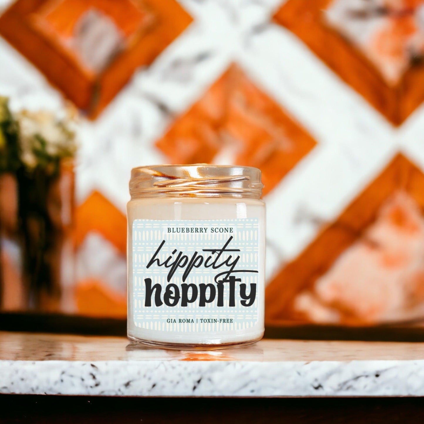 Blueberry Scone Candle by Gia Roma in clear glass jar with a blue label on Tampa Home & Garden Store