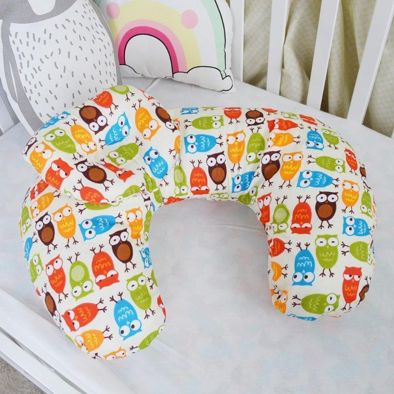 Newborn U-shaped nursing pillow by Stevvex with colorful owl print cover on Tampa Home & Garden Store