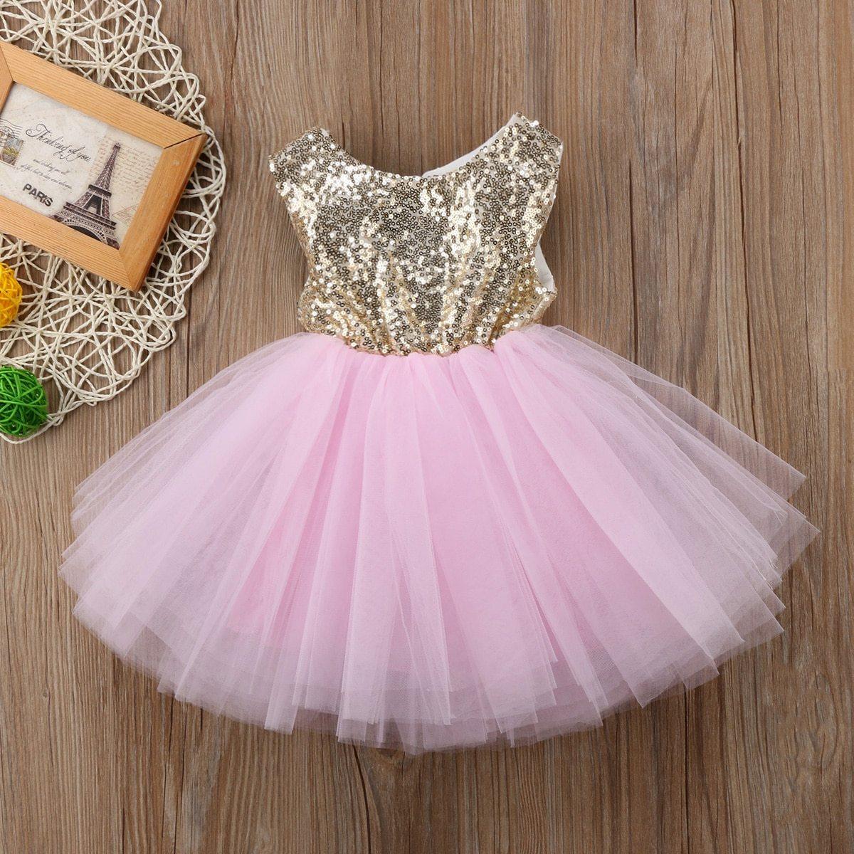 Baby girl sleeveless sequin dress with gold bodice and pink tulle skirt by Stevvex on Tampa Home & Garden Store