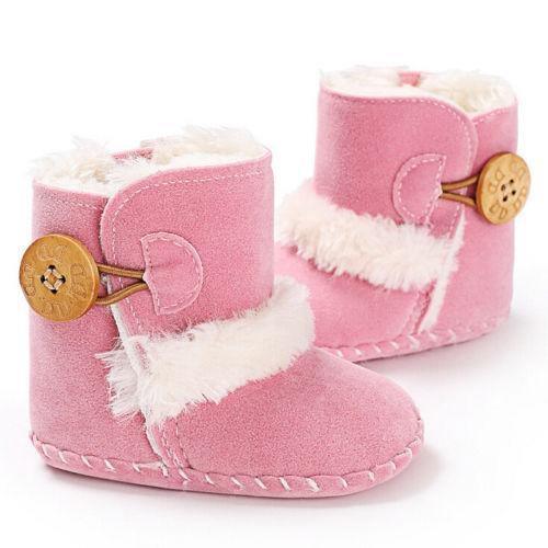 Stevvex pink baby boots with faux fur trim and wooden button strap for first steps crawlers on Tampa Home & Garden Store