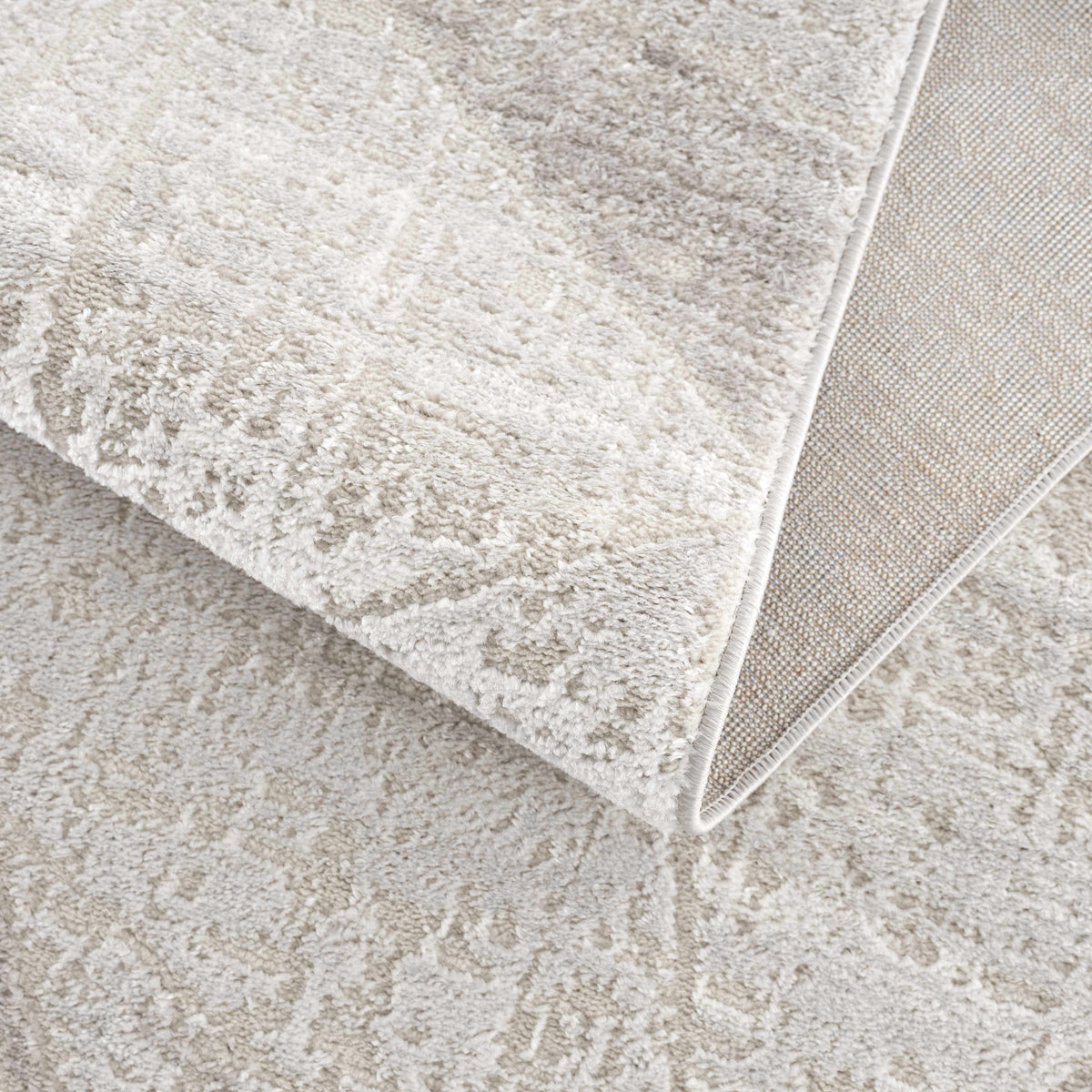 Basia Area Rug beige shag with plush pile and woven border Boutique Rugs clearance on Tampa Home & Garden Store