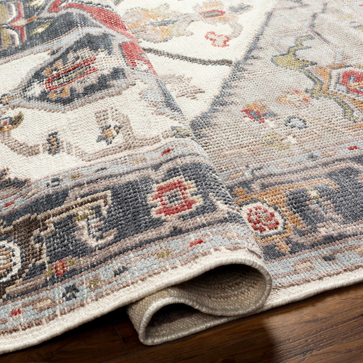 Halayhayin Premium Rug by Boutique Rugs, cream geometric pattern, textured weave on wood floor on Tampa Home & Garden Store