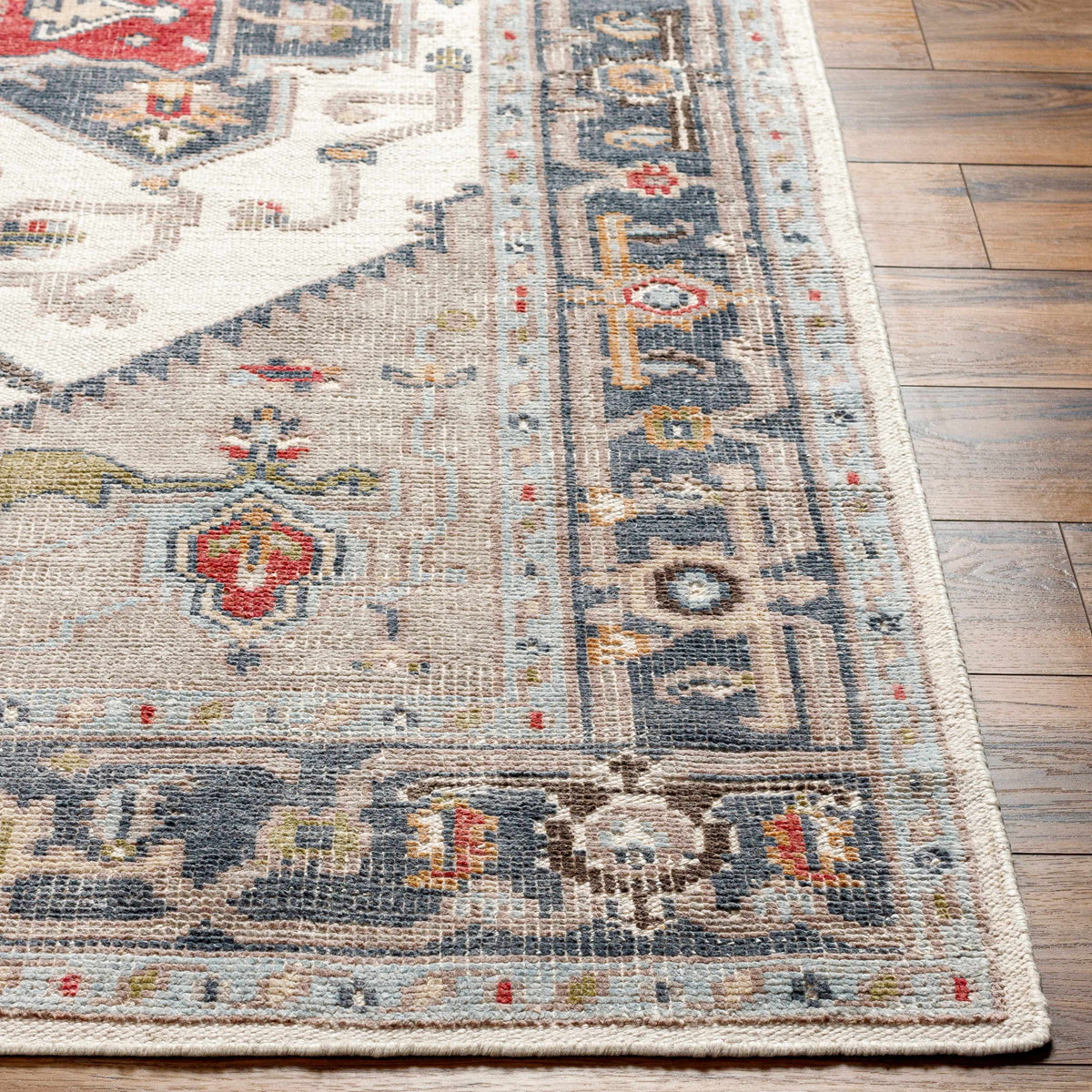 Halayhayin Premium Rug by Boutique Rugs, blue and cream geometric border with red accents on cream backdrop on Tampa Home & Garden Store