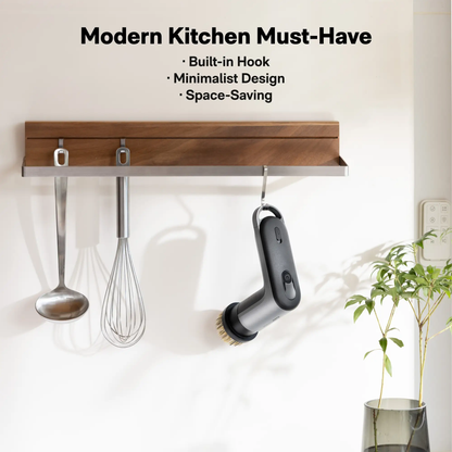 HOTO Grip Cordless Spin Scrubber black/gray with round brush head, hanging on wall rack on Tampa Home & Garden Store