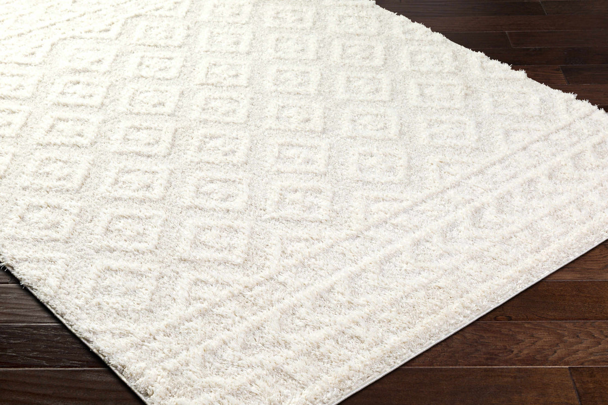 Eivin Cream Diamonds Plush Rug by Boutique Rugs; cream shag with diamond pattern on wood floor on Tampa Home & Garden Store