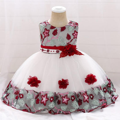 Stevvex baby dress with lace bodice and tulle skirt, gray embroidered top and red floral accents on Tampa Home & Garden Store