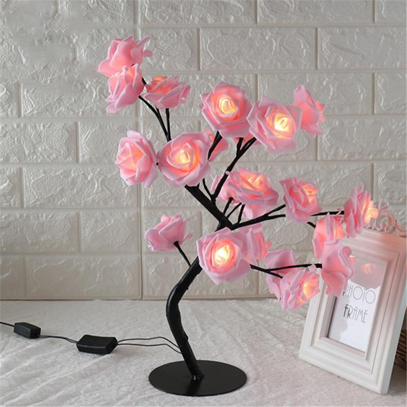 Stevvex rose-shaped table lamp with pink glowing blossoms on a black branch tree base on Tampa Home & Garden Store