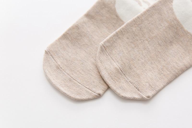 Baby socks beige with white polka dot pattern, 100% cotton, unisex knit close-up on Tampa Home & Garden Store