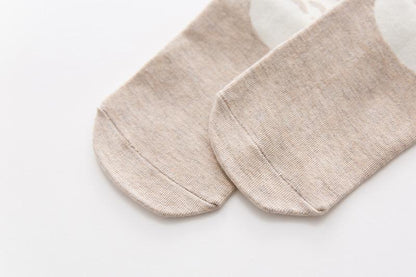 Baby socks beige with white polka dot pattern, 100% cotton, unisex knit close-up on Tampa Home & Garden Store