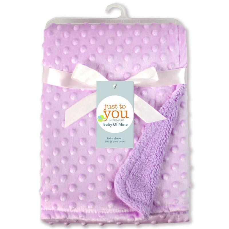 Receiving blanket Stevvex lavender minky with dotted texture and white ribbon tag on Tampa Home & Garden Store