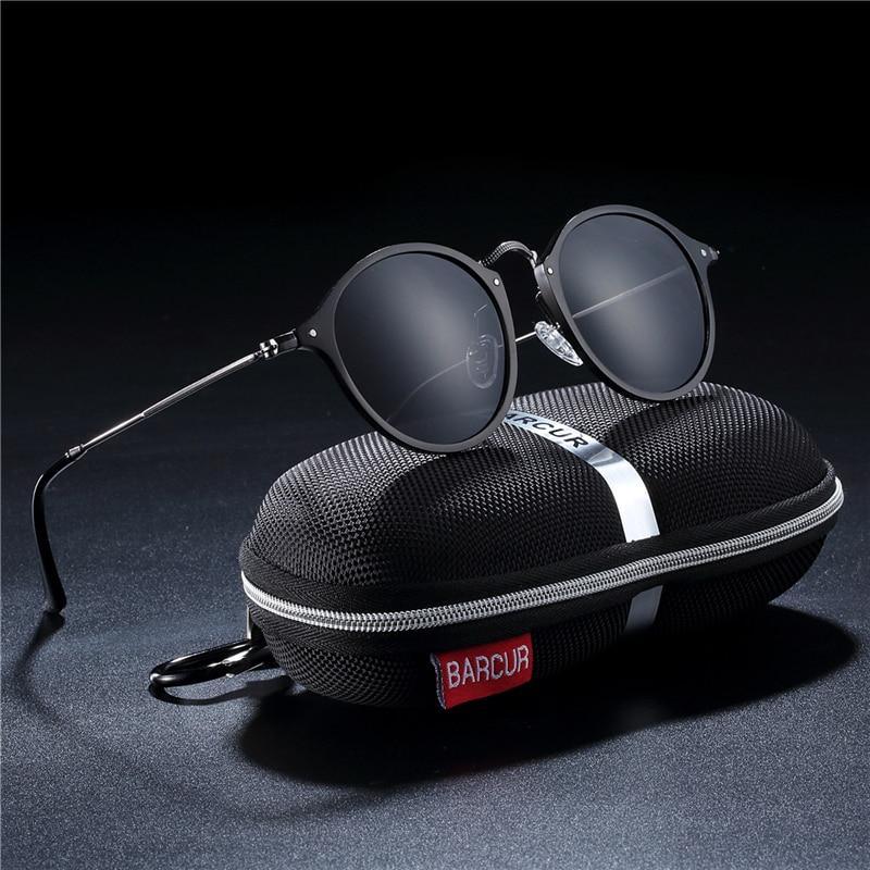 Vintage round sunglasses by Stevvex with black metal frame and UV400 lenses on a hard case on Tampa Home & Garden Store
