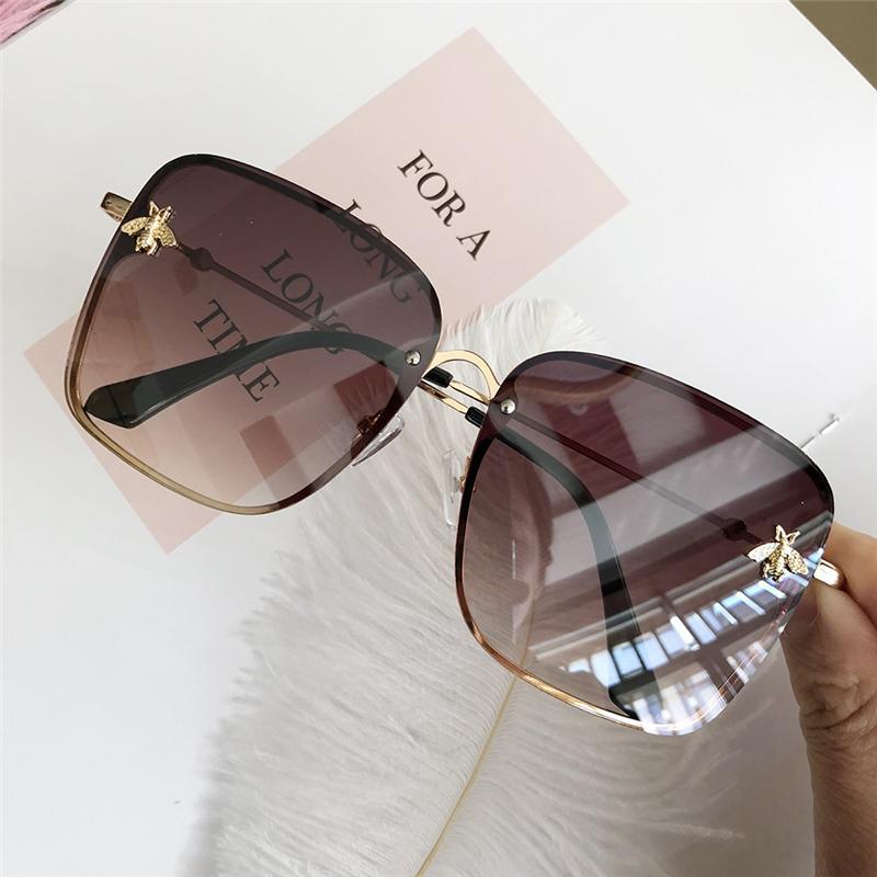 Stevvex oversize square sunglasses with brown gradient lenses, gold frame, star accents on Tampa Home & Garden Store