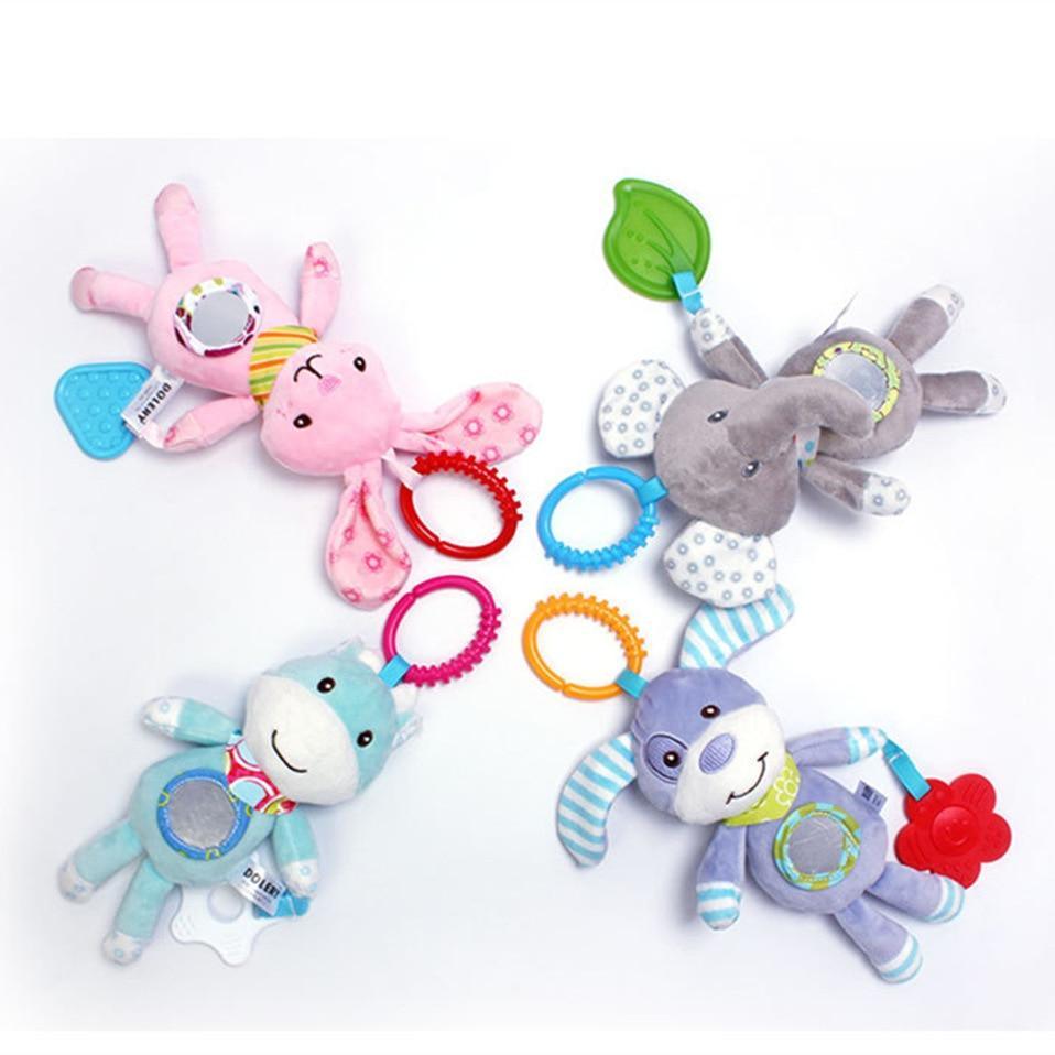Four-piece Stevvex baby rattles plush toy set with hanging rings in pink blue gray purple on Tampa Home & Garden Store