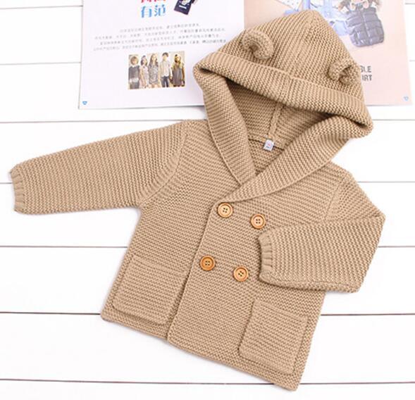 Knitting Cardigan beige hooded newborn by Stevvex with front pockets and wooden buttons on Tampa Home & Garden Store