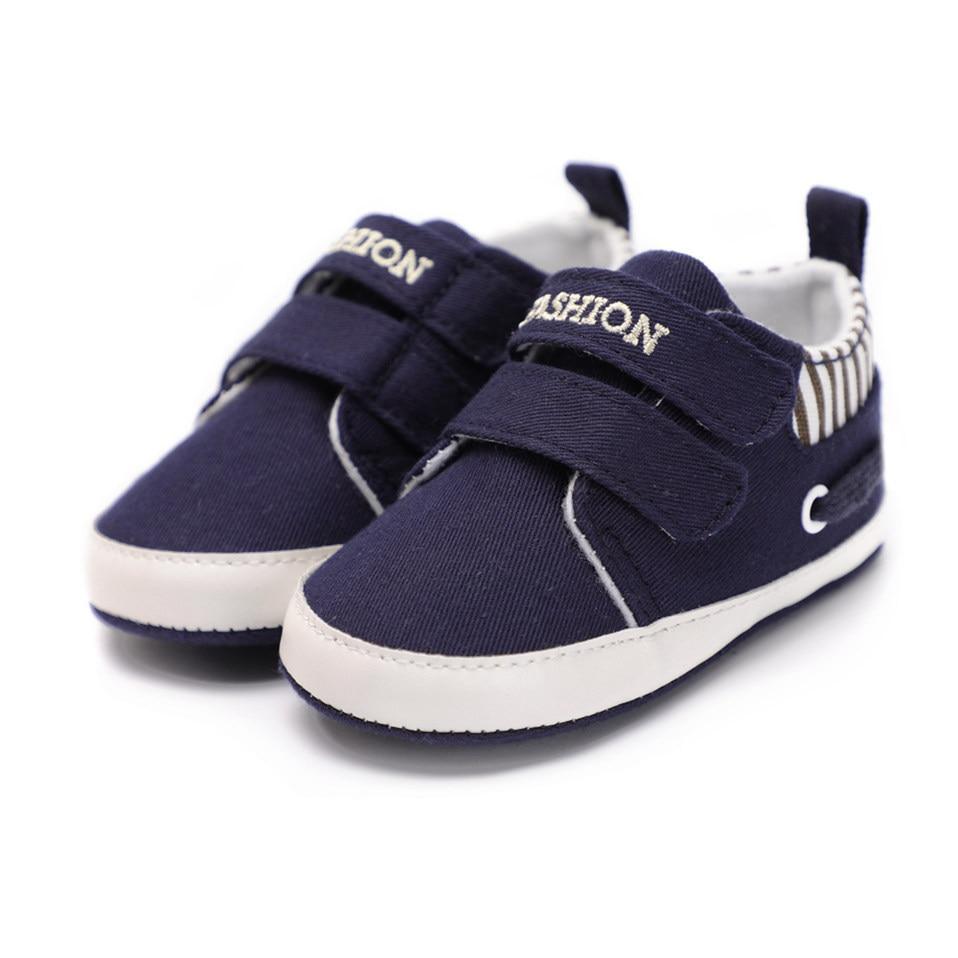 Stevvex navy canvas first walkers infant shoes pair with Velcro straps and white sole on Tampa Home & Garden Store