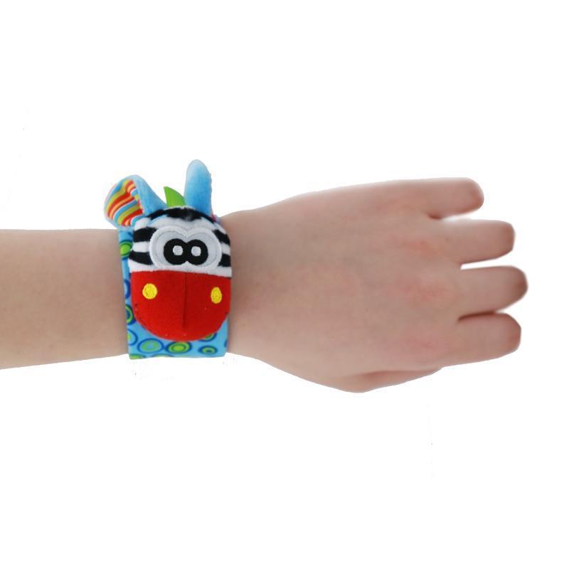 Stevvex infant wrist rattle bracelet, colorful plush blue strap and red ladybug face on Tampa Home & Garden Store