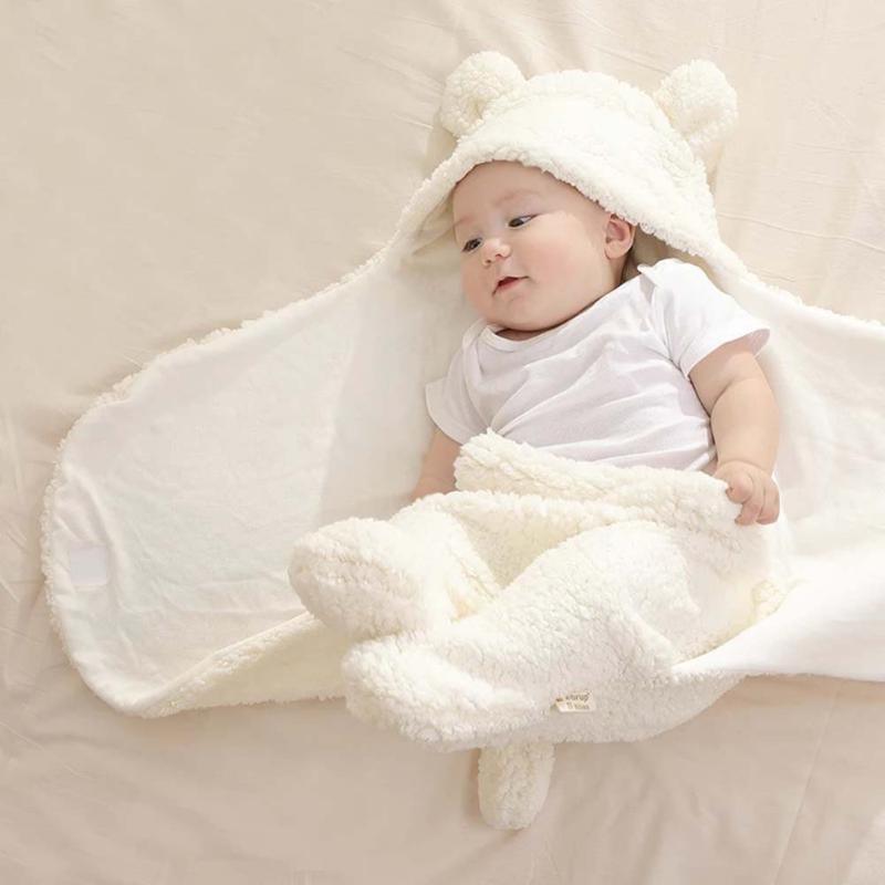 Stevvex baby blanket swaddle with bear-ear hood, ivory fleece, baby wrapped in soft envelope on Tampa Home & Garden Store