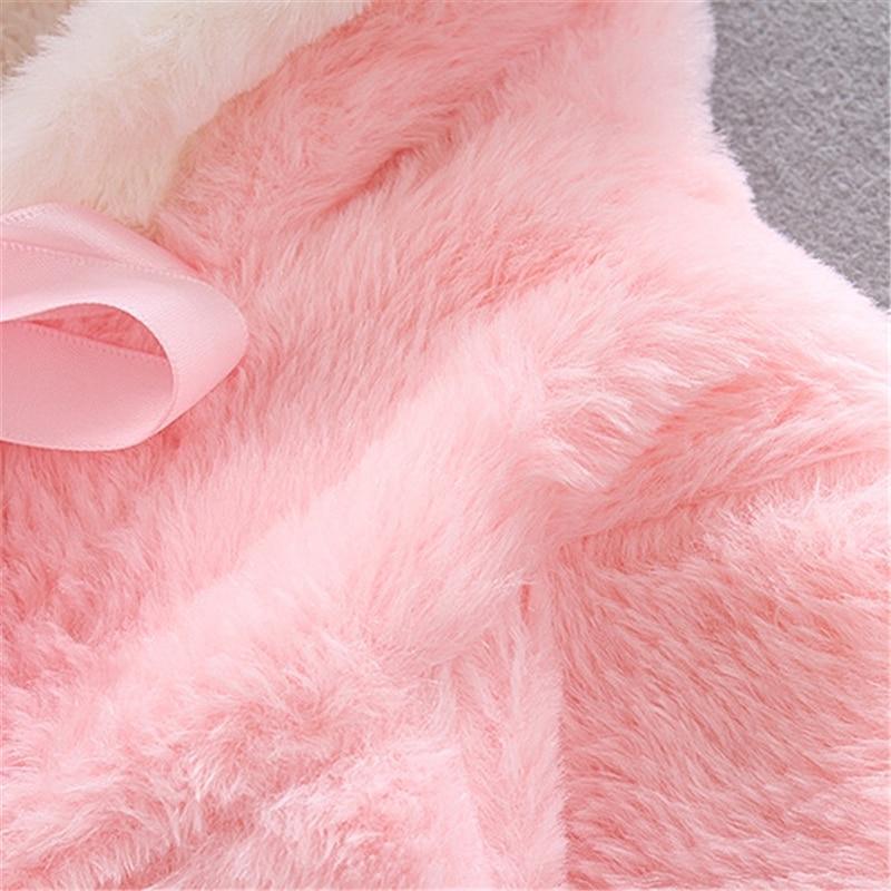 Pink plush faux fur baby coat for newborn girls with a satin bow on Tampa Home & Garden Store
